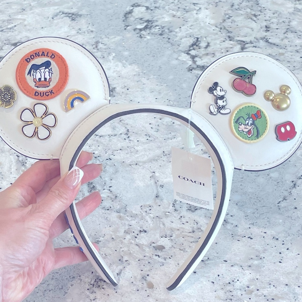 White Disneyland Coach ears never worn with tags